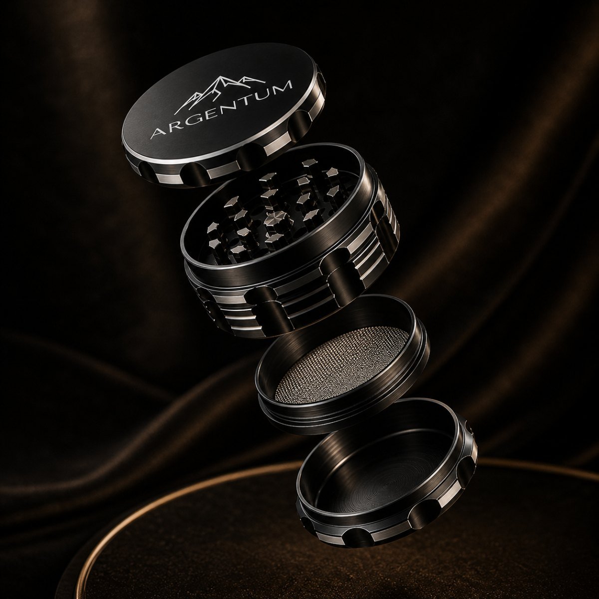 Exploded view of the ARGENTUM grinder with its four chambers floating apart against a dark background